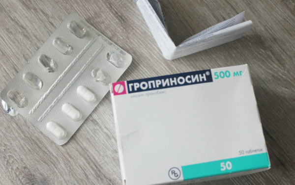 Гроприносин в виде продолговатых двояковыпуклых таблеток белого цвета